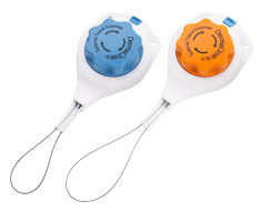 Two circular devices with an orange and blue dial, attached to white handles, featuring wire loops for hanging.